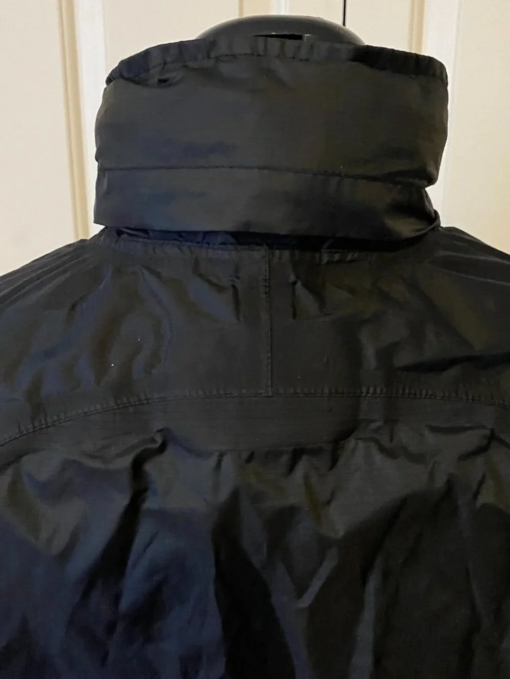 REI black raincoat - Boy's Large